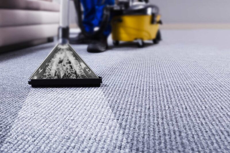 Cleaning A Carpet With A Water Vaccum